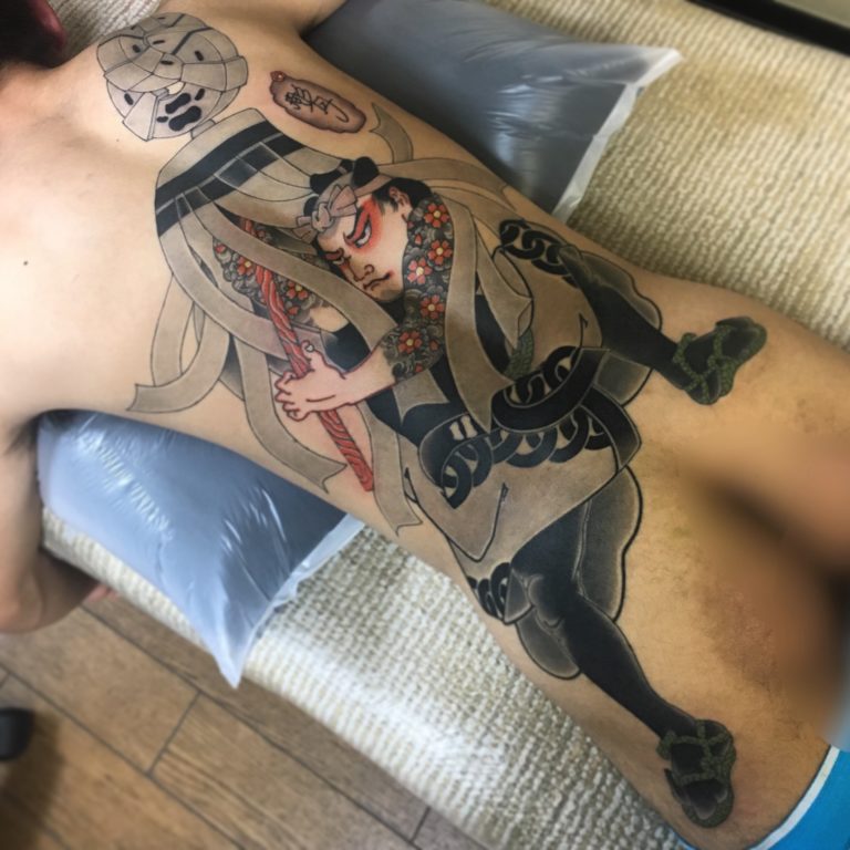 背中一面　火消しのタトゥー作品の写真